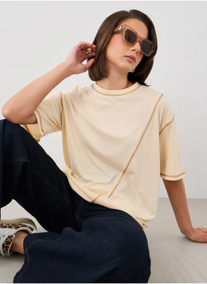 ستايلي Solid Round Neck T-Shirt with Contrast Stitching Detail