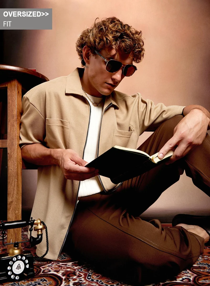 Campus Sutra Campus Sutra Men's Sand Beige Waffle-Utility Oversized Shirt For Casual Wear | Spread Collar | Short Regular Sleeves | Zipper Closure | Oversized Shirt Crafted With Comfort Fit For Everyday Wear