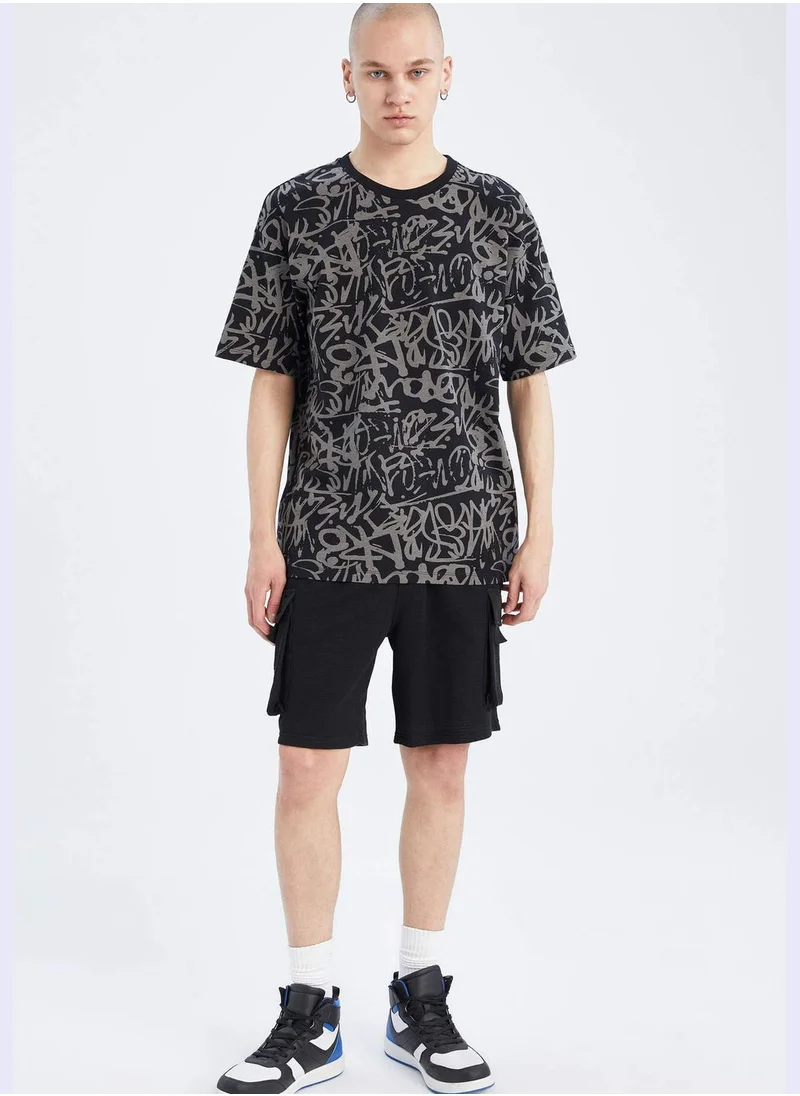 ديفاكتو Boxy Fit Short Sleeve Printed T-Shirt