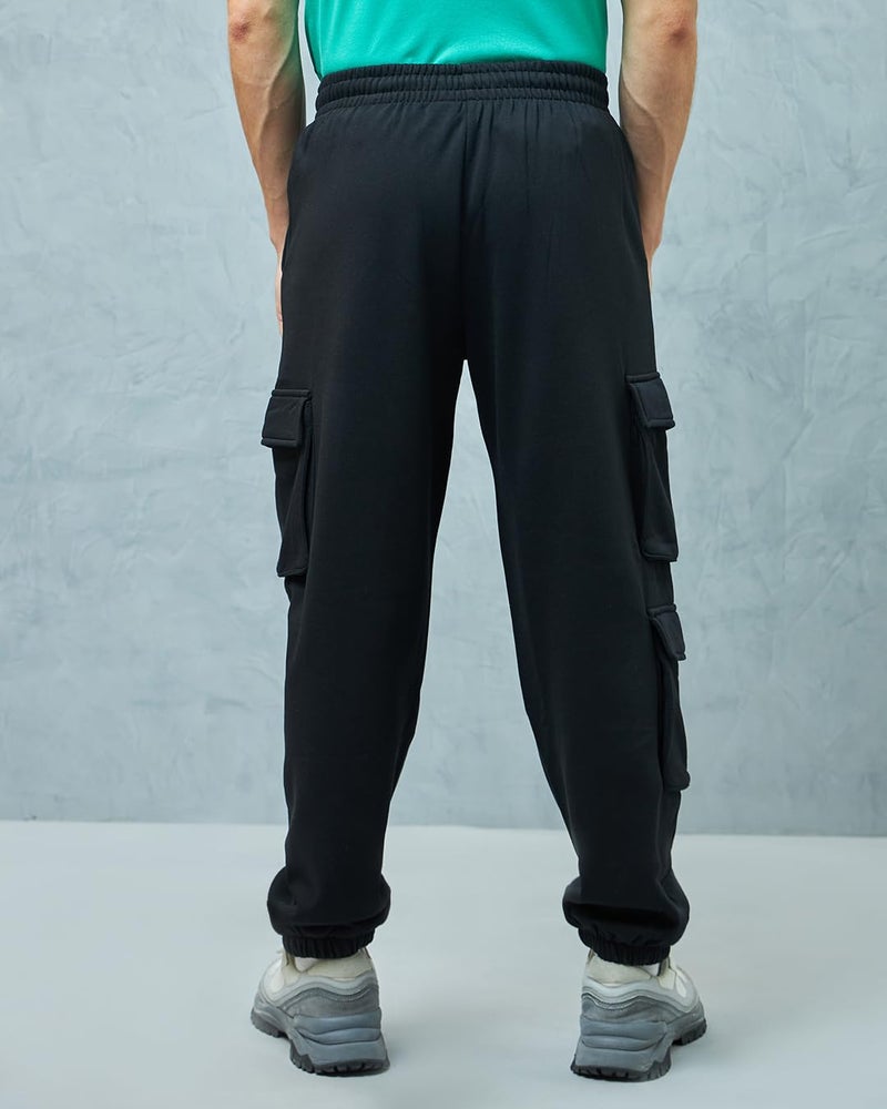 Bewakoof Men's Solid Super Loose Fit Cotton Blend Cargo Joggers_ 617399 Black M - Image 4