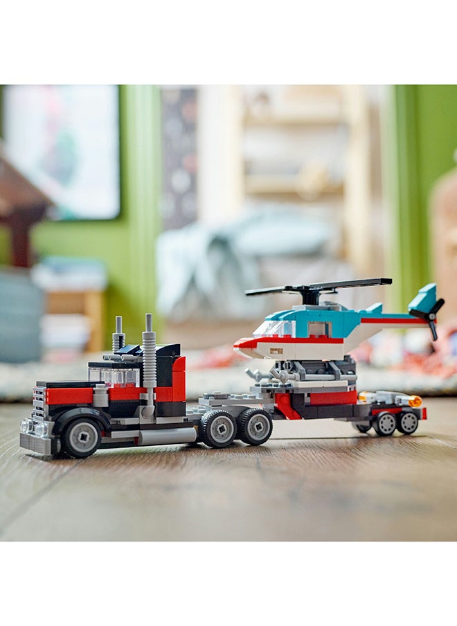 LEGO - 31146 مبدع شاحنة مسطحة 3 في 1 مع طائرة هليكوبتر إلى طائرة مروحية ومركبة وقود إلى سيارة رود ساخنة وسيارة SUV، فكرة هدية للصبية والفتيات الذين تتراوح أعمارهم بين 7 سنوات وما فوق - Image 1