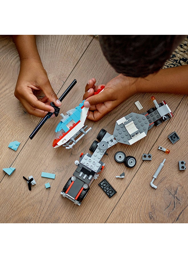LEGO - 31146 مبدع شاحنة مسطحة 3 في 1 مع طائرة هليكوبتر إلى طائرة مروحية ومركبة وقود إلى سيارة رود ساخنة وسيارة SUV، فكرة هدية للصبية والفتيات الذين تتراوح أعمارهم بين 7 سنوات وما فوق - Image 1