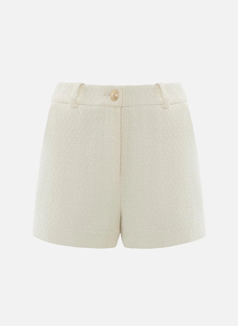 Lichi Tweed mini shorts with golden fittings