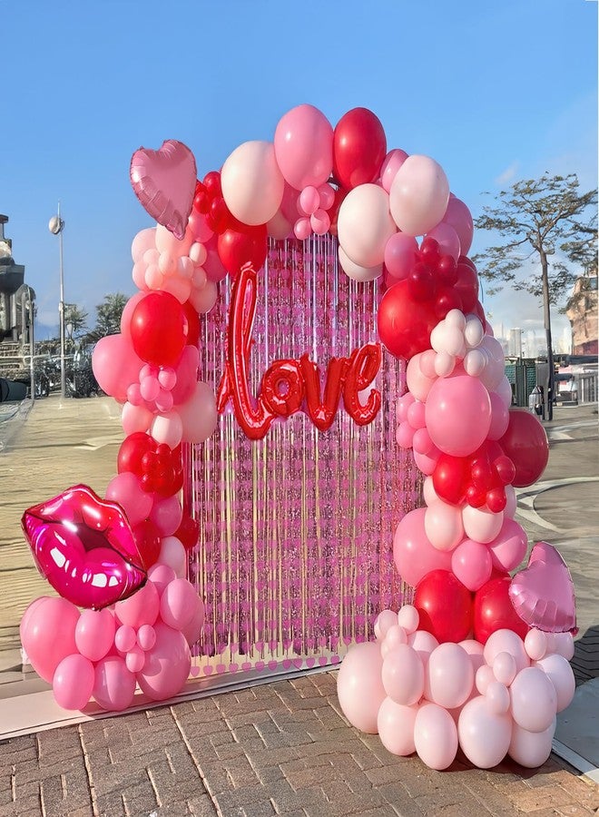طقم قوس بالونات عيد الصداقة (Galentines Day) - بالونات باللون الأحمر والوردي الفاتح والوردي الماكرون مع بالونات على شكل قلوب وشفاه - ستائر خلفية لحفلات عيد الحب وعيد الصداقة (Galentines Day) وحفلات الذكرى السنوية للفتيات - Image 1