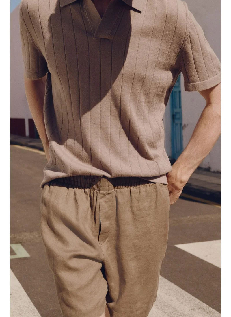 اتش اند ام Regular Fit Linen-blend polo shirt