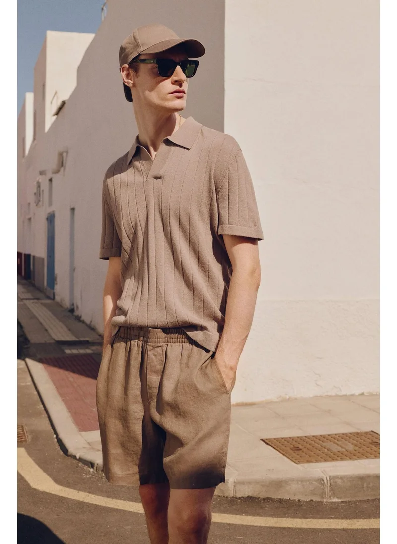 اتش اند ام Regular Fit Linen-blend polo shirt