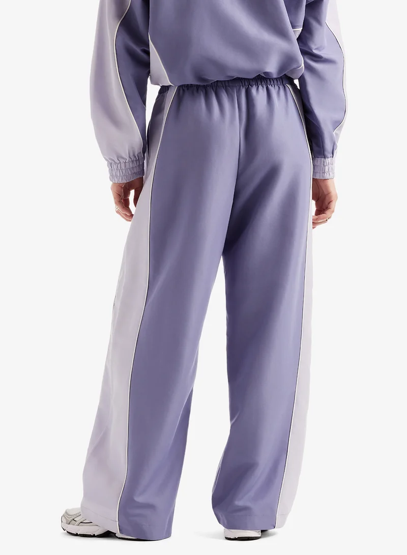 New Balance Trackside Woven Sweatpants