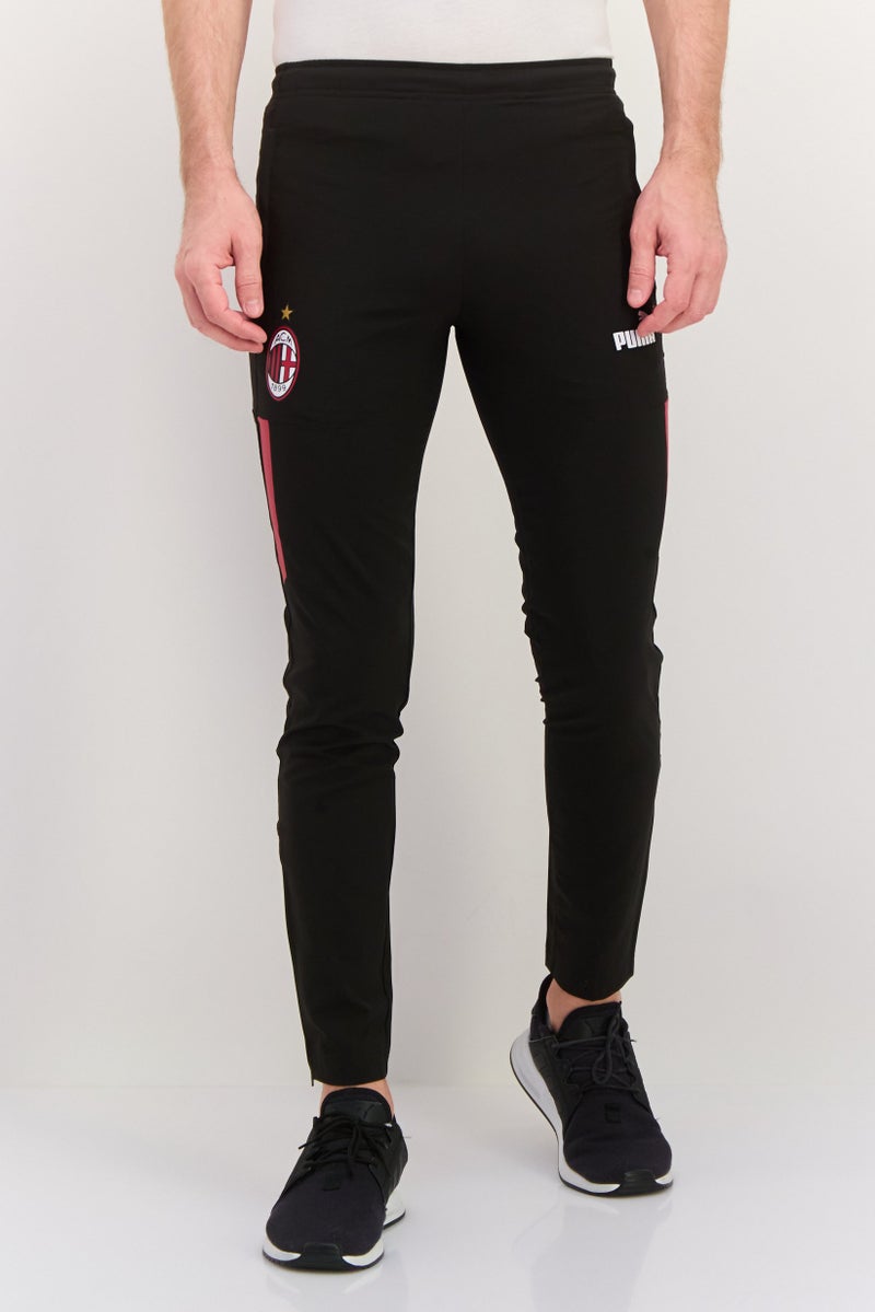 PUMA شورتات خارجية للرجال بقصة ضيقة بشعار العلامة التجارية، أسود - Image 1