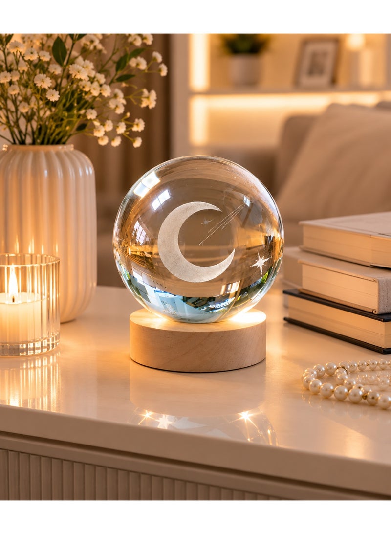 "A beautiful design of a spherical crystal made of high quality heavy crystal with a 3D pattern of a crescent cloud inside. " - Image 1