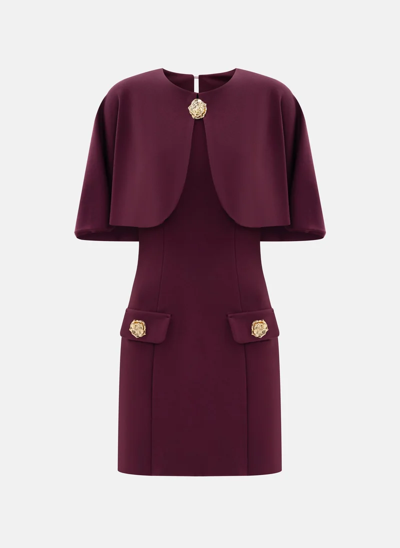 Lichi Mini dress with shoulder cape and flower buttons