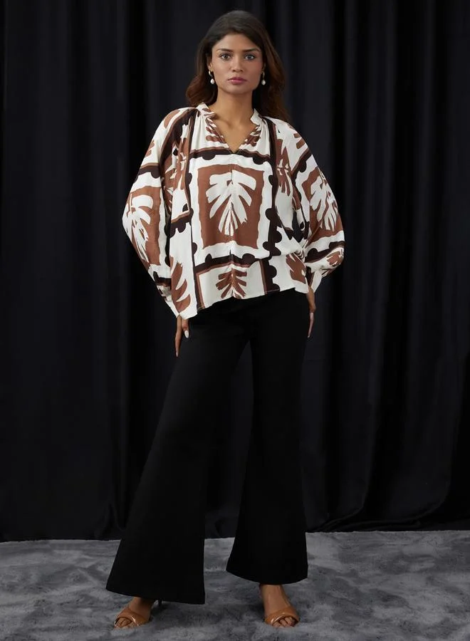 globus Women Brown Abstract Print V-Neck Top