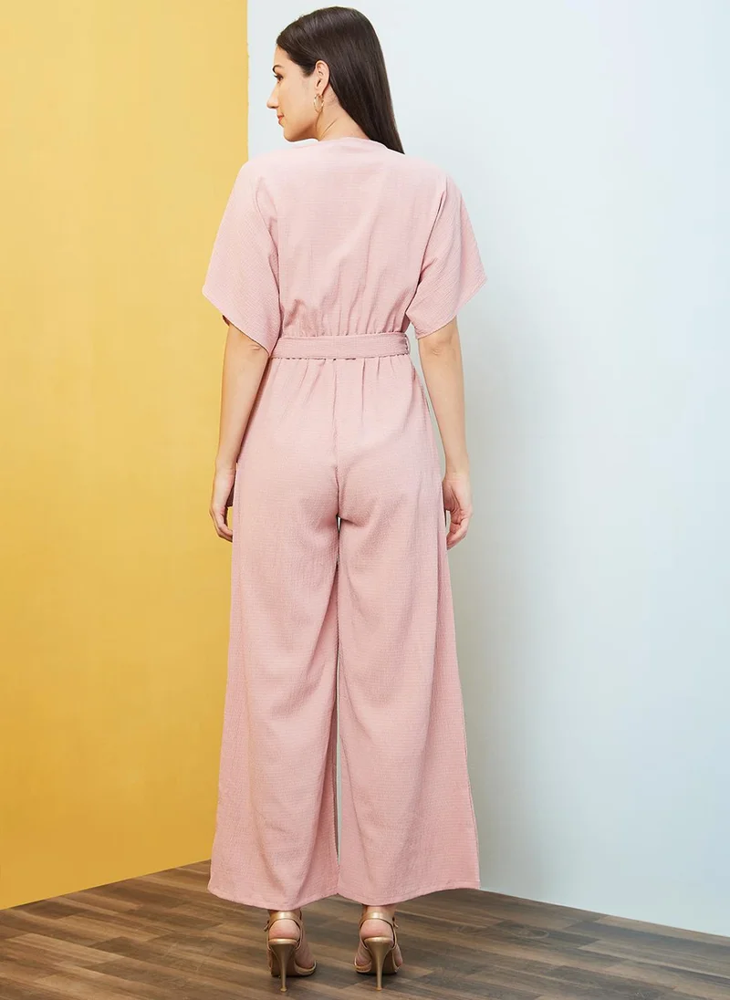 Globus pink Globus Women's Pink Self Design Casual Jumpsuit with Round Neck V Cut Kimono Sleeves and Belted Waist for Women | Best Price UAE