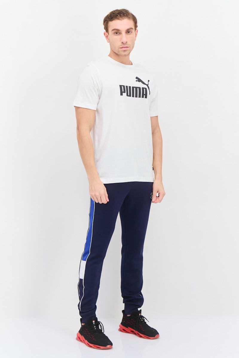 PUMA تي شيرت تدريب رياضي للرجال بشعار العلامة التجارية، أبيض/أسود - Image 4