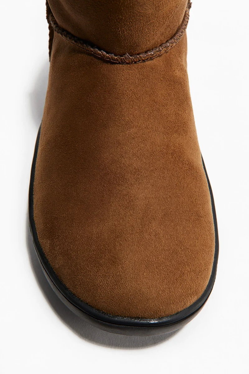 اتش اند ام بوت مبطن يمنح الدفء