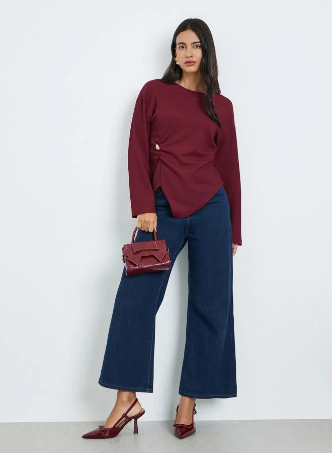 ستايلي بلوزة بارزة الملمس بتفاصيل أزرار