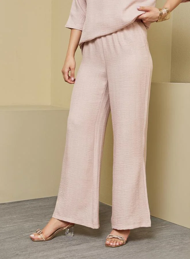 ستايلي Oversized Collared Top and Wide Leg Pants Modest Set