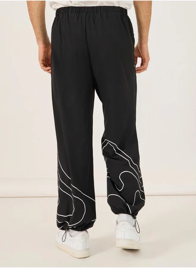 ستايلي NASA Print Parachute Track Pants with Toggle Cuffed