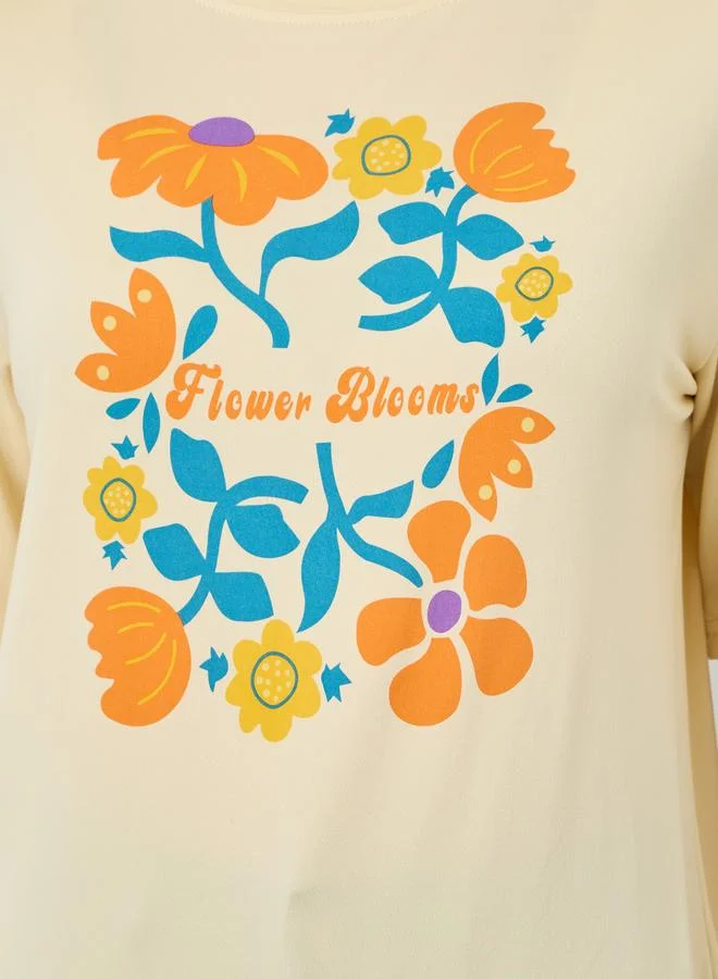 Styli Women Beige Floral Graphic Oversized T-Shirt