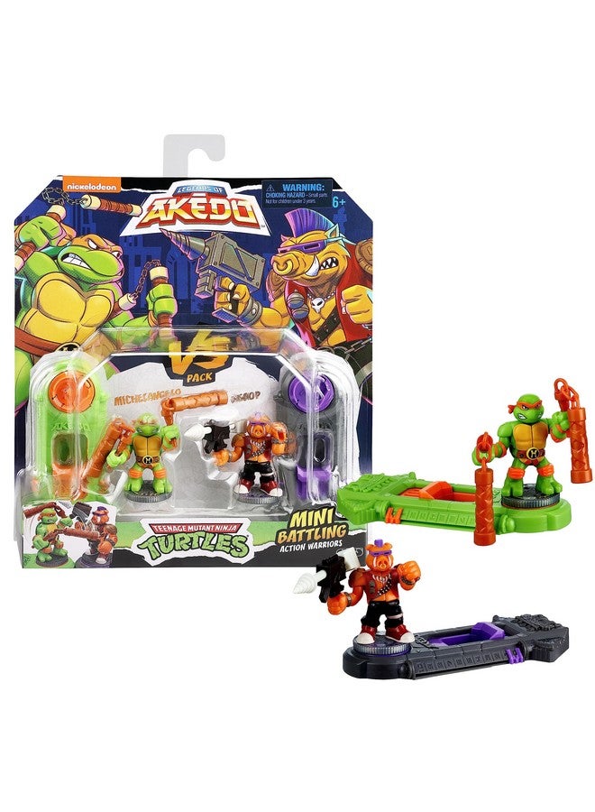 AKEDO Legends of Akedo Teenage Mutant Ninja Turtles. Mini Battling Warriors Versus Pack Michelangelo Vs Bebop With 2 Figures, 1 Instruction Manual, 2 Trigger Controllers - Image 1