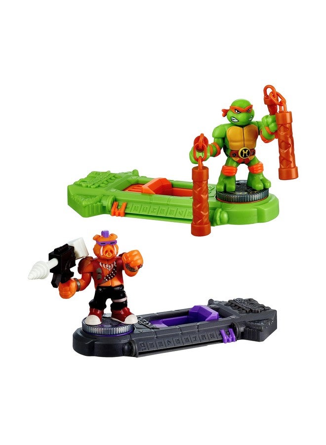 AKEDO Legends of Akedo Teenage Mutant Ninja Turtles. Mini Battling Warriors Versus Pack Michelangelo Vs Bebop With 2 Figures, 1 Instruction Manual, 2 Trigger Controllers - Image 3