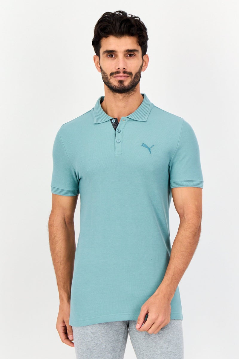 PUMA قميص بولو خارجي بأكمام قصيرة للرجال بتصميم ضيق مع شعار مطرز، أزرق بحري - Image 1