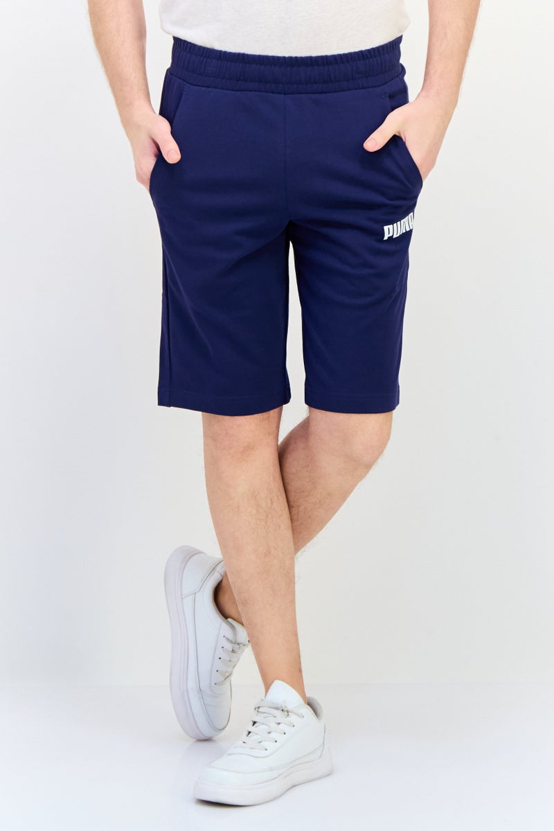 PUMA شورتات رياضية للرجال، مناسبة للجري، لون أزرق داكن - Image 1