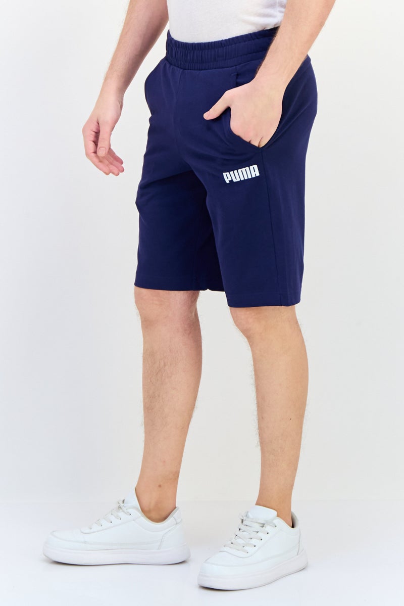 PUMA شورتات رياضية للرجال، مناسبة للجري، لون أزرق داكن - Image 2