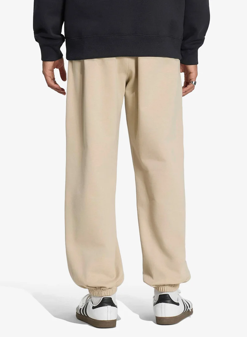 Adidas Originals KHATHR Essential Trefoil Loose Sweatpants for Men | Best Price UAE