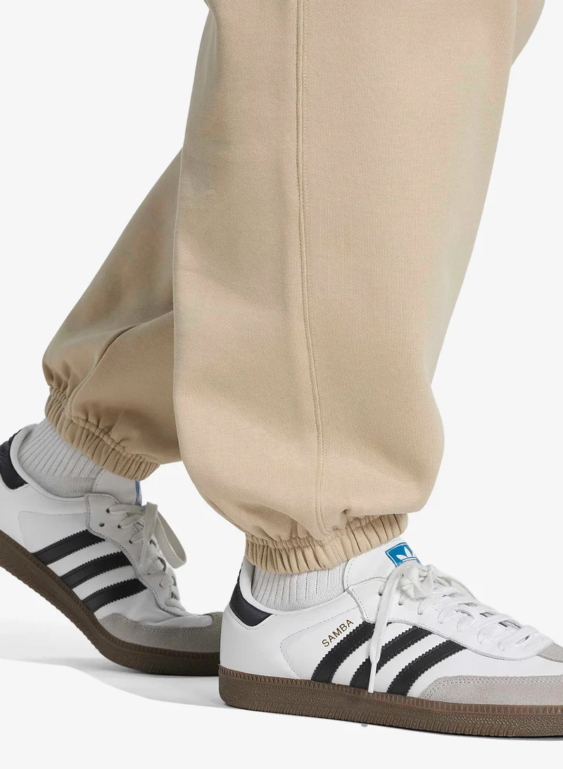 Adidas Originals KHATHR Essential Trefoil Loose Sweatpants for Men | Best Price UAE