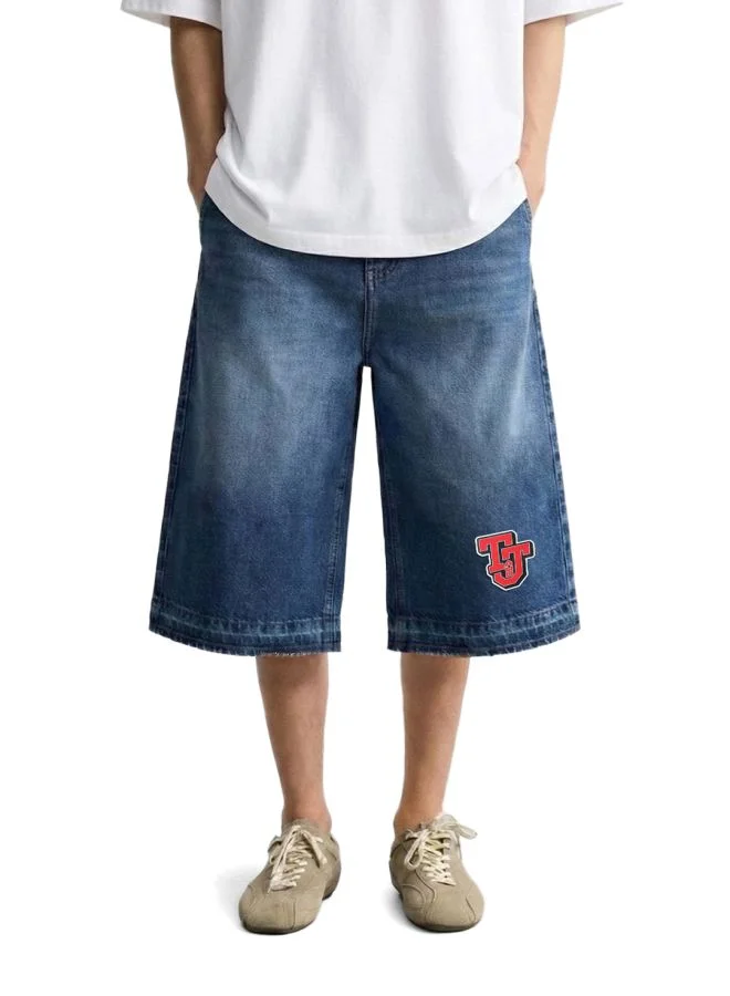 ذا انديان كراج كو Men Wide Leg Tom & Jerry Printed Scoop Pocket Mid-Rise Denim Shorts