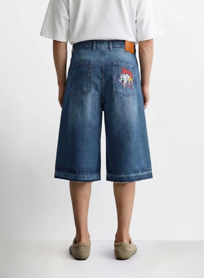 ذا انديان كراج كو Men Wide Leg Tom & Jerry Printed Scoop Pocket Mid-Rise Denim Shorts