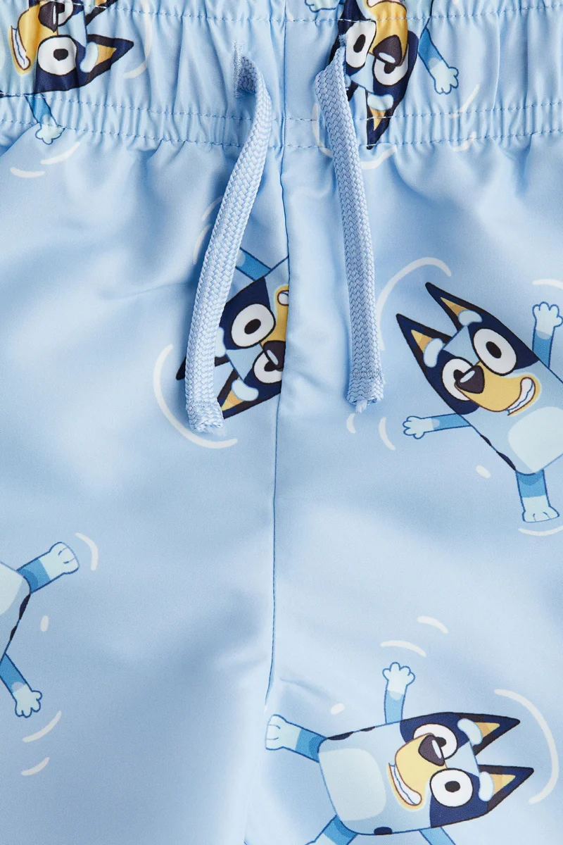 اتش اند ام شورت سباحة مزين برسمة