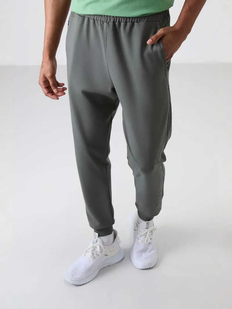 تومي لايف TOMMY Men's Regular Fit Cotton Blend Sweatpants