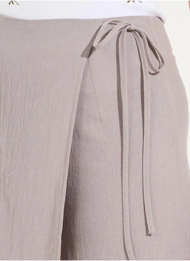 Styli Solid Wrap Front Skort with Side Tie Up Detail
