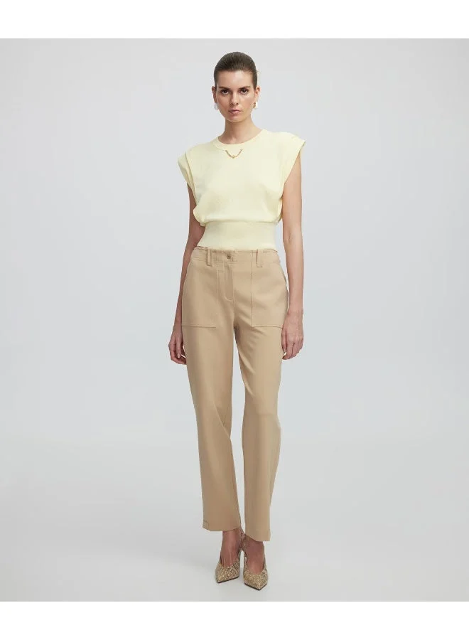 ابيكول بلوزة محبوكة بتفاصيل سلسلة