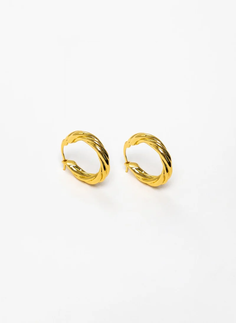 Lichi Twisted earrings in glossy metal