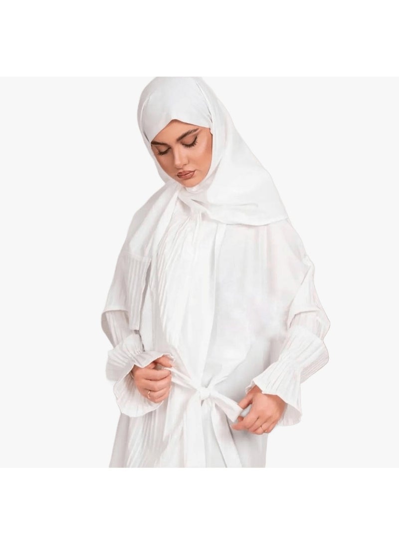 Women's prayer garment featuring an open front with a tie closure and a loose, comfortable fit; designed with soft, pleated sleeves and made from lightweight fabric suitable for prayer, Umrah, Hajj, and daily use.