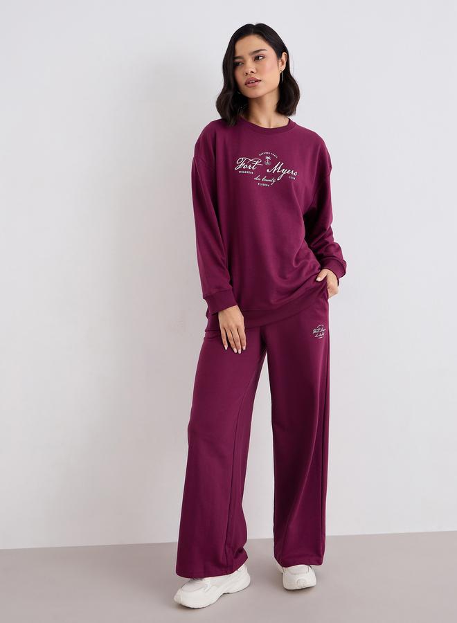 ستايلي طقم منسق من جوغر وسويت شيرت بطبعة جرافيك - Image 2