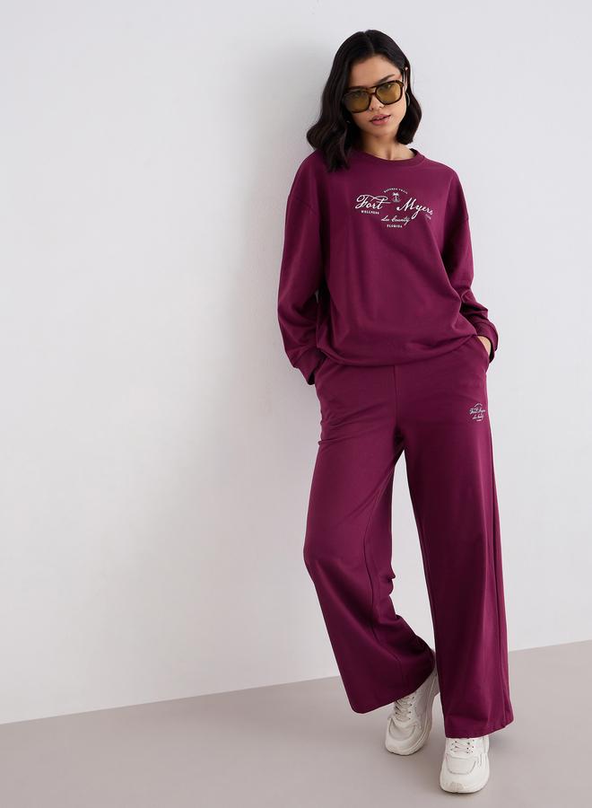 ستايلي طقم منسق من جوغر وسويت شيرت بطبعة جرافيك - Image 1