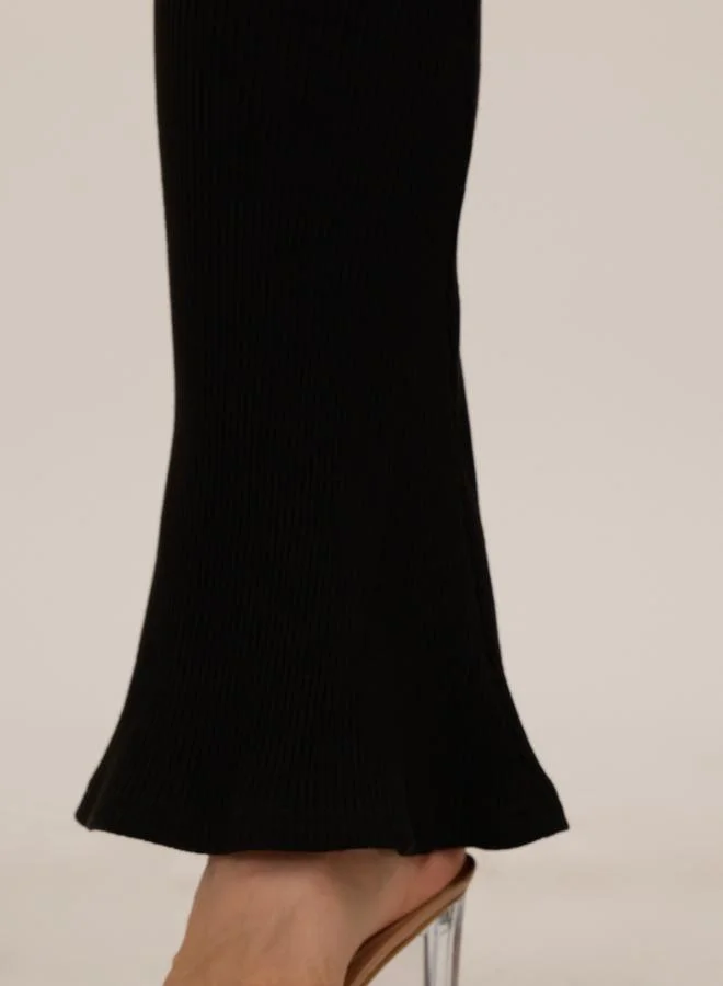 Outzidr  Black Ribbed Basic Flared Leggings for Women | Best Price UAE