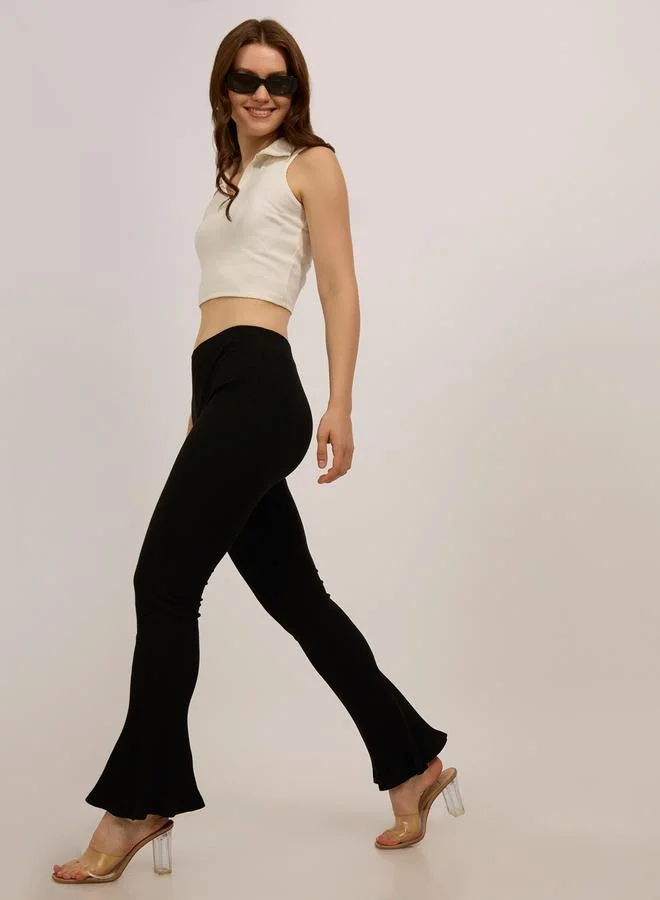 Outzidr  Black Ribbed Basic Flared Leggings for Women | Best Price UAE