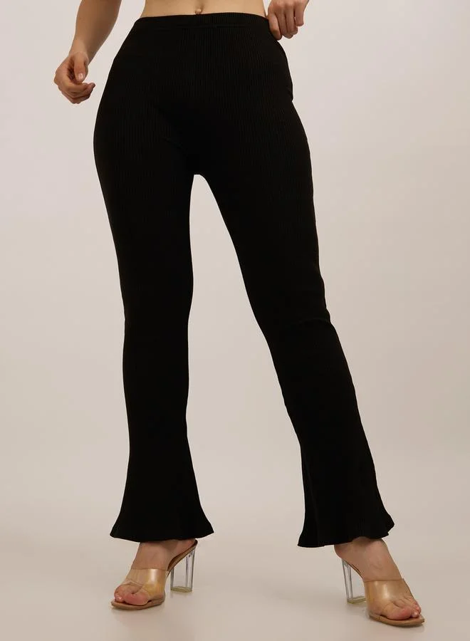 Outzidr  Black Ribbed Basic Flared Leggings for Women | Best Price UAE