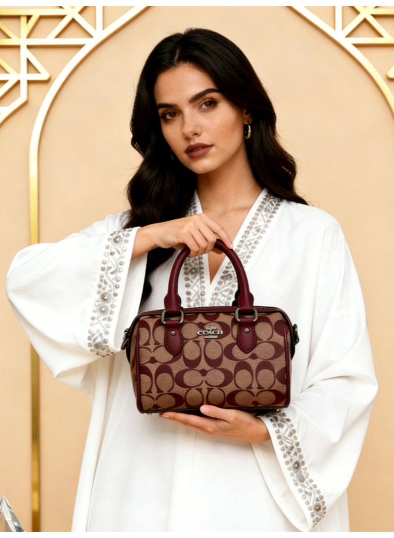 coachoutlet Coach Mini Rowan Mini Boston Bag is a handbag, women's shoulder bag, crossbody bag, briefcase, clutch, and evening bag, as well as a shopping tote bag. For all occasions including work, travel, parties, and gift-giving. - Image 2
