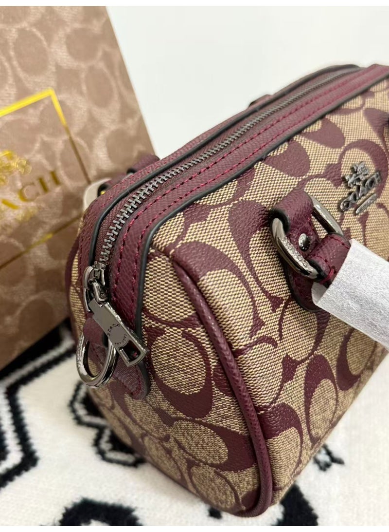coachoutlet Coach Mini Rowan Mini Boston Bag is a handbag, women's shoulder bag, crossbody bag, briefcase, clutch, and evening bag, as well as a shopping tote bag. For all occasions including work, travel, parties, and gift-giving. - Image 3