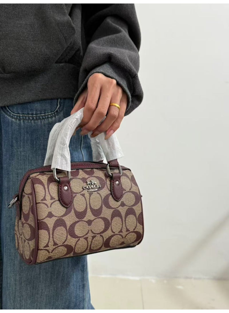 coachoutlet Coach Mini Rowan Mini Boston Bag is a handbag, women's shoulder bag, crossbody bag, briefcase, clutch, and evening bag, as well as a shopping tote bag. For all occasions including work, travel, parties, and gift-giving. - Image 5