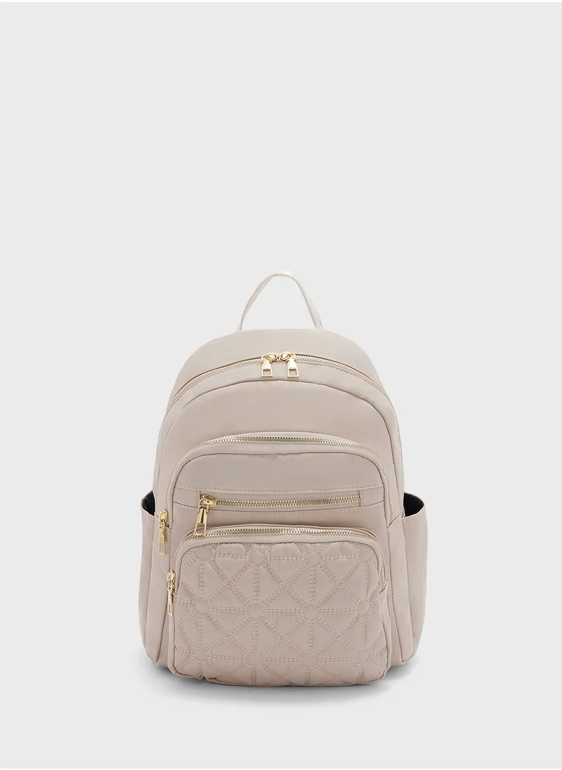 جينجر Quilted Panel Backpack