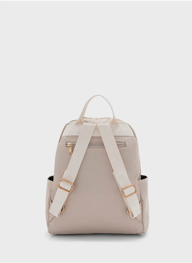 جينجر Quilted Panel Backpack