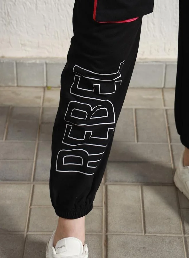 هوبرهولمي بنطلون كارغو نسائي أسود قطن مطبوع بقصة عادية وطول كامل