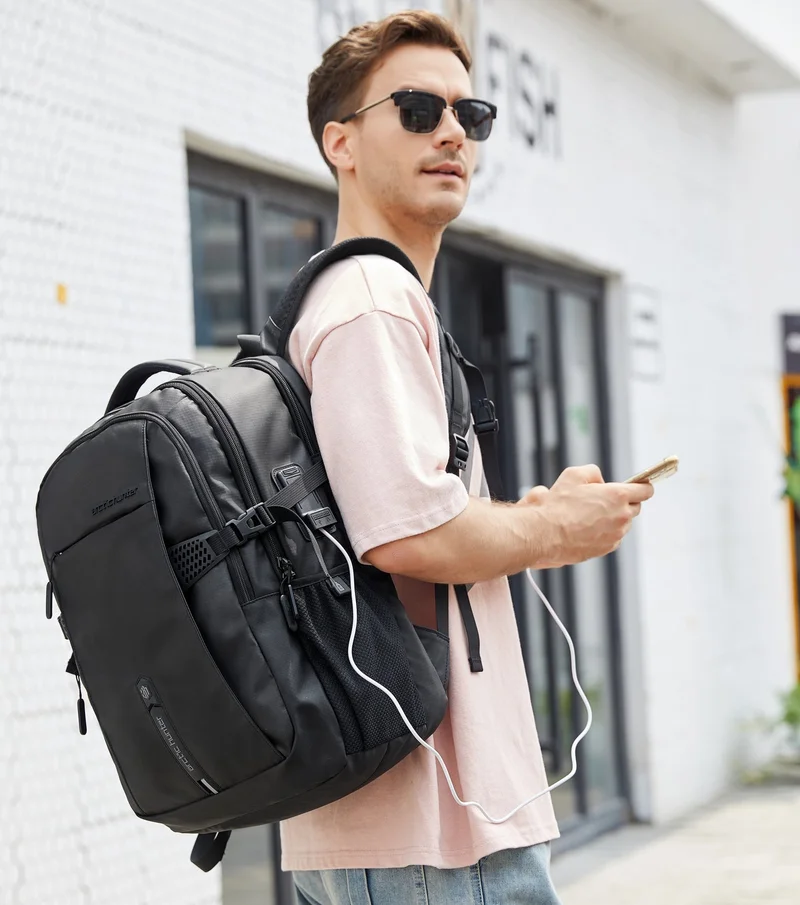 Arctic Hunter Black Travel Daypack Water Repellant Scratch Resistant 30L Backpack with Built In USB/Headphone Port for Men and Women, B00388, Black  | Best Price UAE