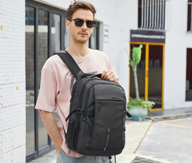 Arctic Hunter Black Travel Daypack Water Repellant Scratch Resistant 30L Backpack with Built In USB/Headphone Port for Men and Women, B00388, Black  | Best Price UAE